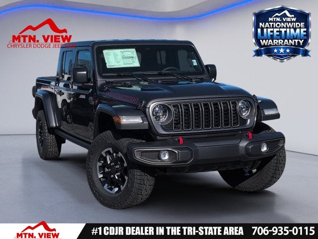 2026 Jeep Gladiator Rubicon in Granite Crystal Metallic Clear-Coat Exterior Paint — front three-quarter view