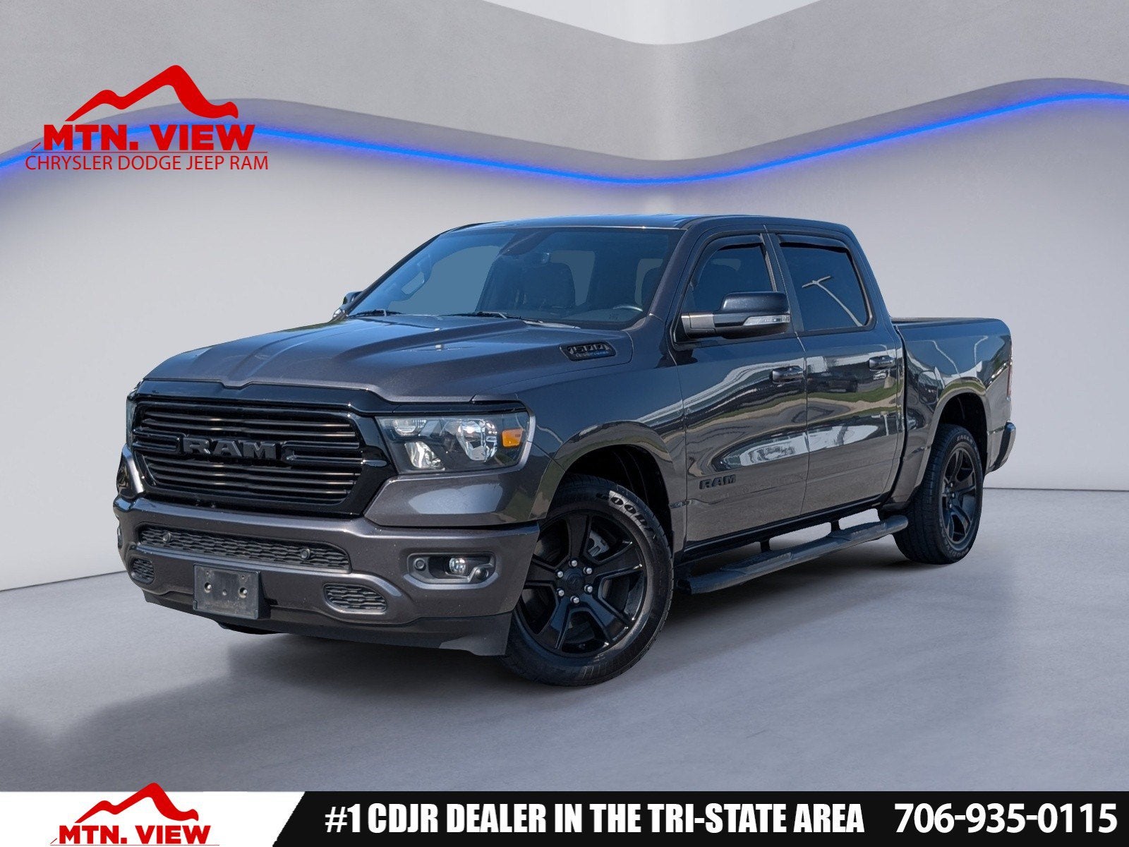 2021 RAM 1500 Big Horn/Lone Star in Granite Crystal Metallic Clearcoat — front three-quarter view