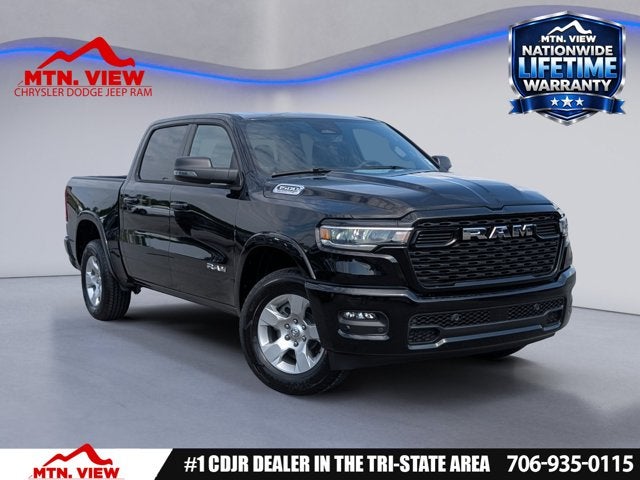 2026 RAM 1500 Big Horn in Diamond Black Crystal Pearl-Coat Exterior Paint — front three-quarter view