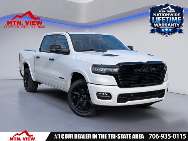 2026 RAM 1500 Laramie in Ivory White Tri-Coat Pearl-Coat Exterior Paint — front three-quarter view