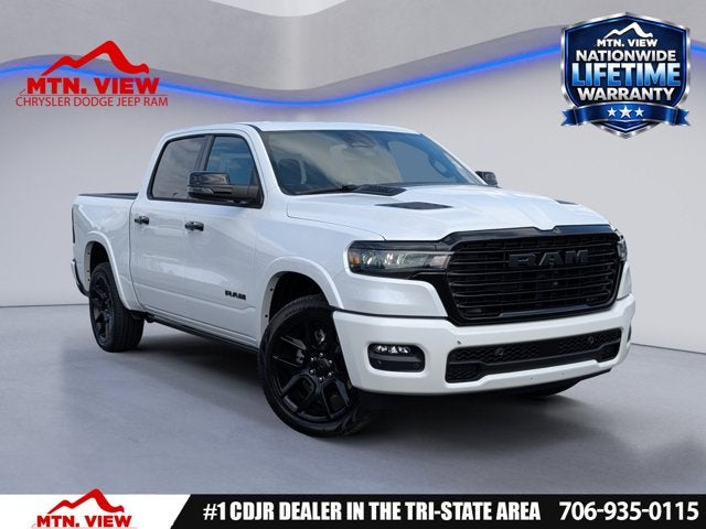 2026 RAM 1500 Laramie in Ivory White Tri-Coat Pearl-Coat Exterior Paint — front three-quarter view