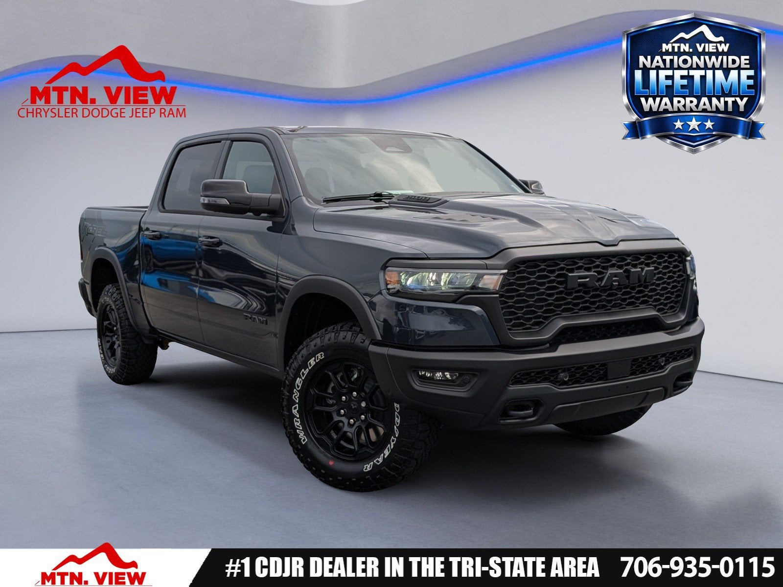 2026 RAM 1500 Rebel in Forged Blue Metallic Exterior Paint — front three-quarter view