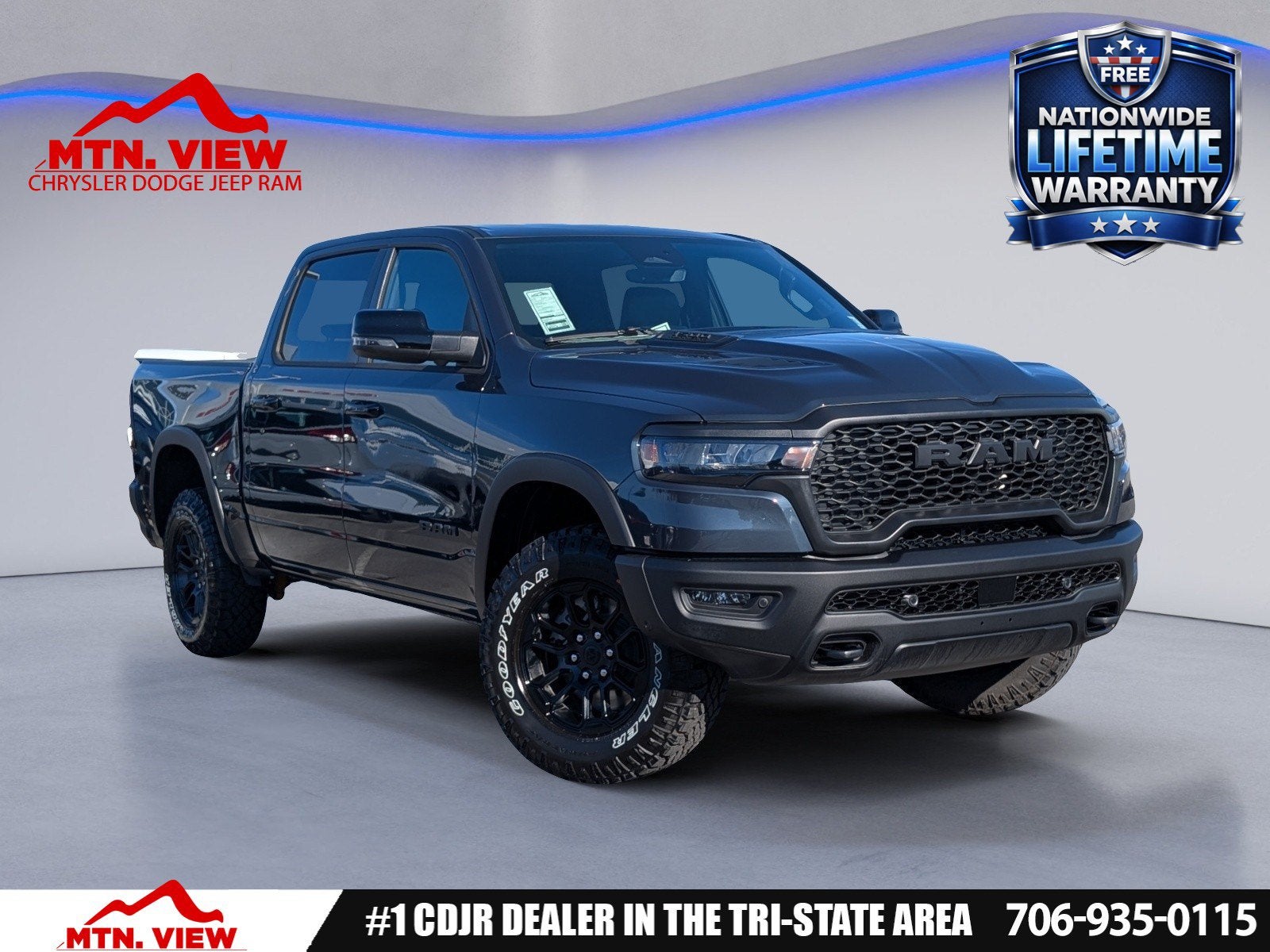 2026 RAM 1500 Rebel in Forged Blue Metallic Exterior Paint — front three-quarter view