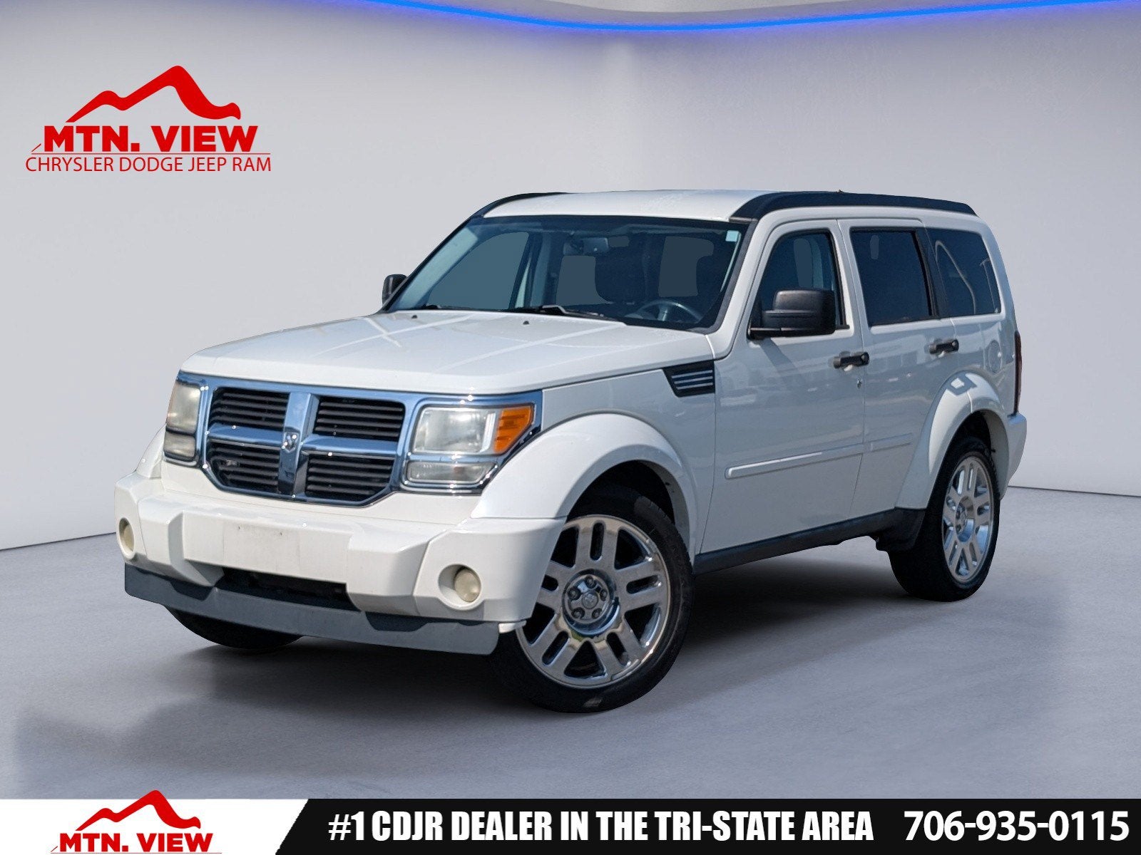 2008 Dodge Nitro SLT in Stone White Clearcoat — front three-quarter view