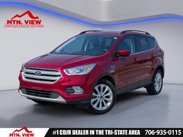 2019 Ford Escape SEL in Ruby Red — front three-quarter view