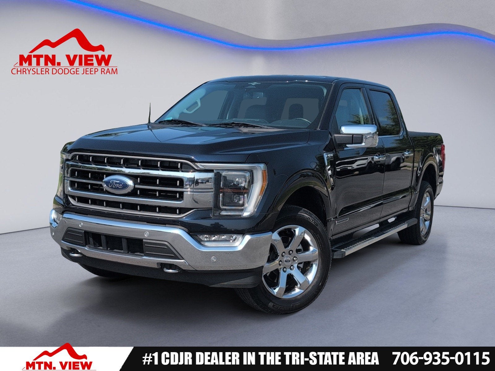 2023 Ford F-150 Lariat in Blue Metallic — front three-quarter view