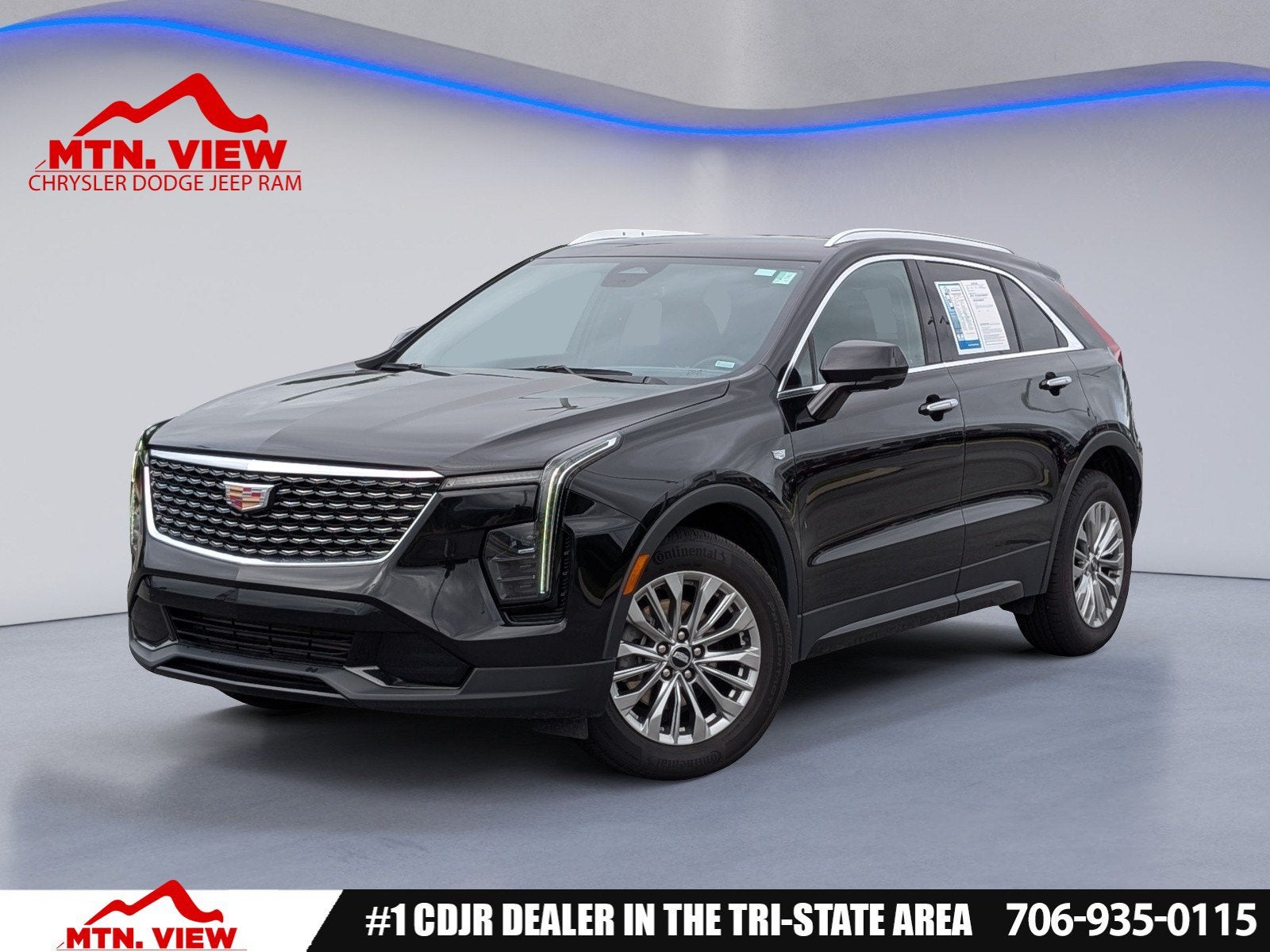 2025 Cadillac XT4 Premium Luxury in Stellar Black Metallic — front three-quarter view
