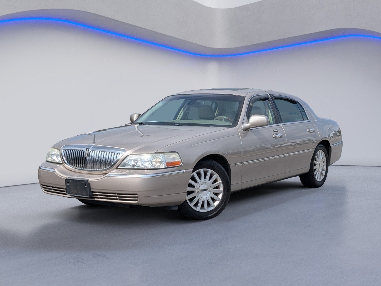 2003 Lincoln Town Car — side profile view