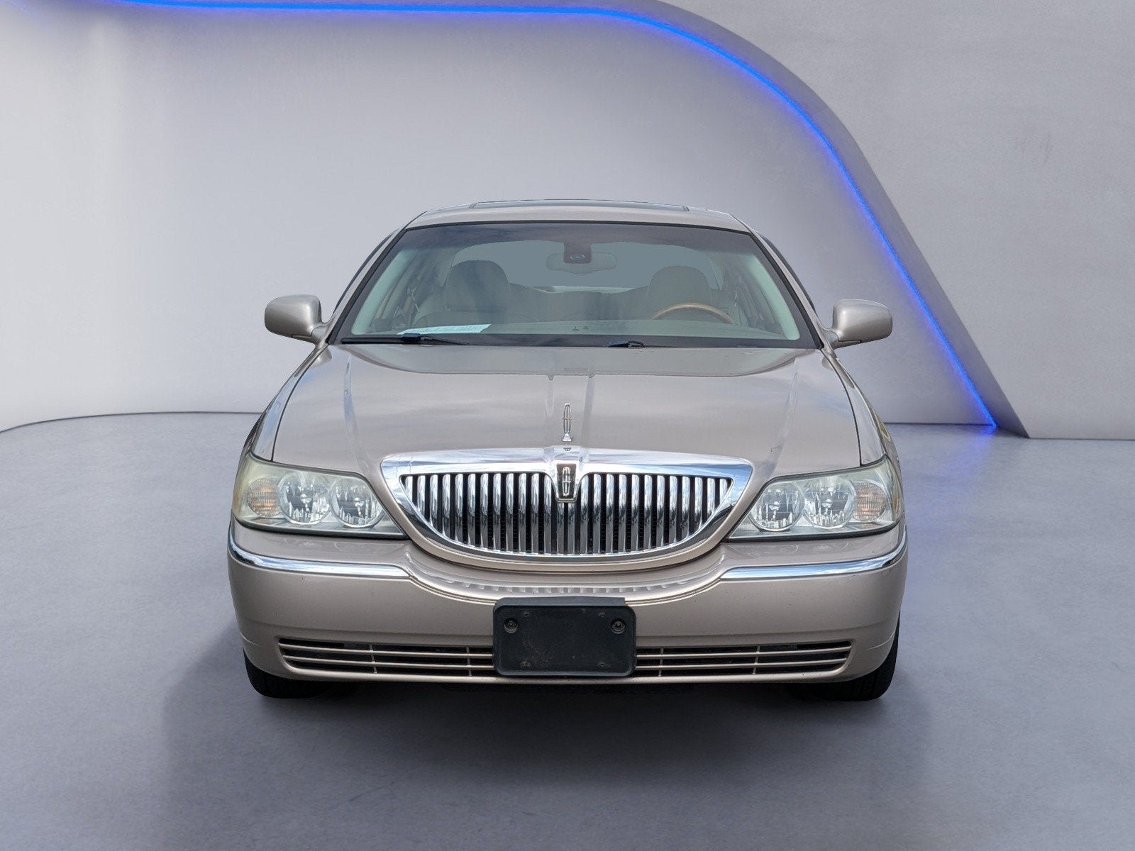 2003 Lincoln Town Car — rear three-quarter view
