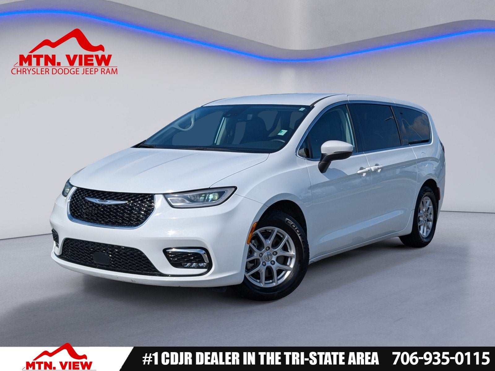 2023 Chrysler Pacifica Touring L in Bright White Clearcoat — front three-quarter view