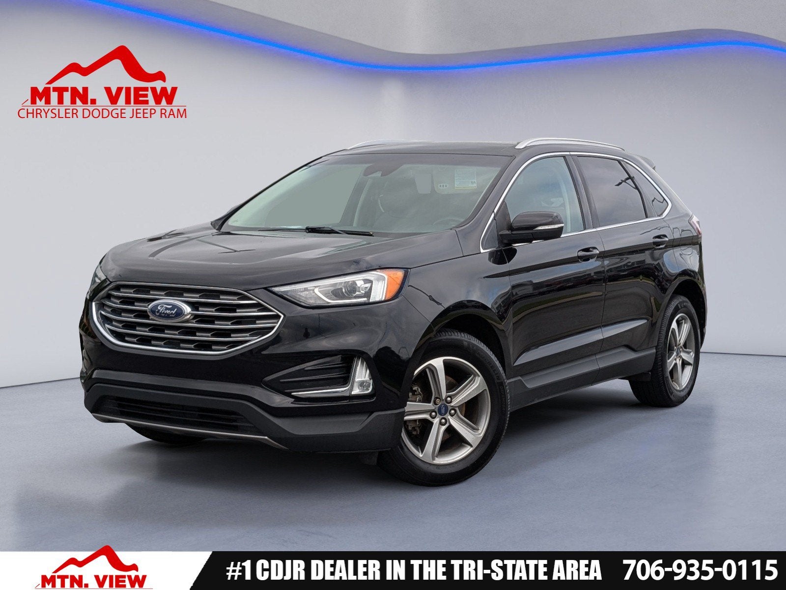 2019 Ford Edge SEL in Agate Black Metallic — front three-quarter view